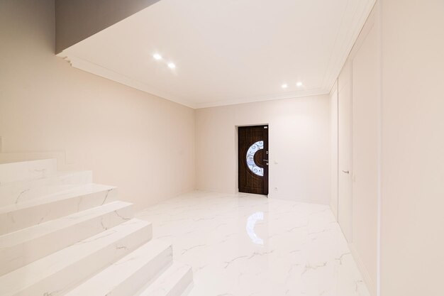 Interior design of a bathroom with light and dark tiles in a new house