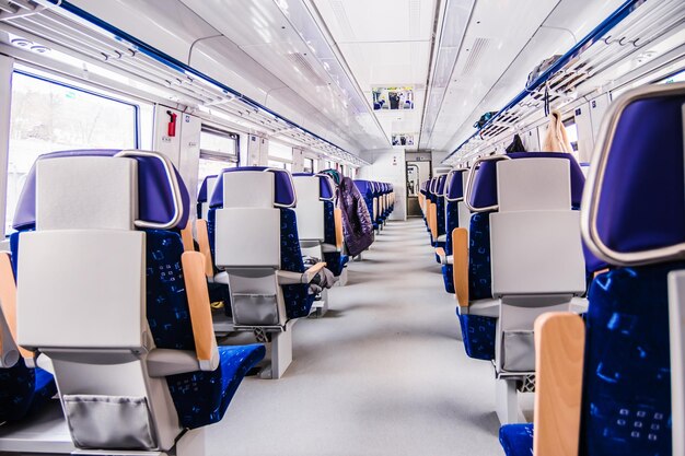 The interior design of a modern train Empty train interior Public transport in the country