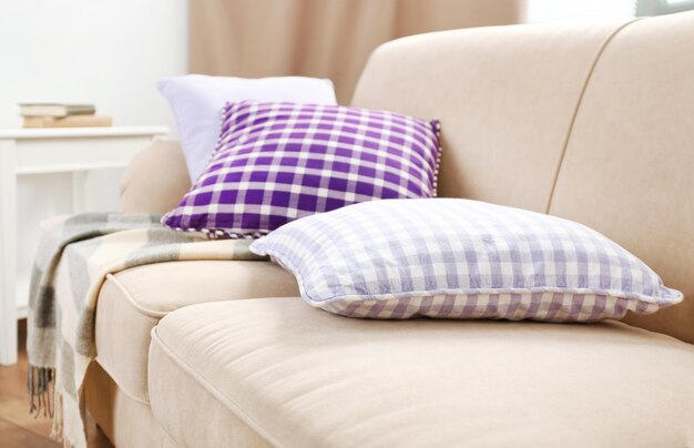 Interior design with pillows on sofa closeup