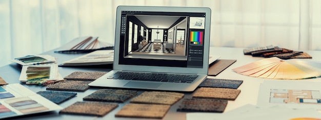 무드 보드 재료와 색상 선택을 위한 다채로운 견본 색상이 포함된 노트북 화면의 인테리어 디자이너 작업 공간 테이블 및 건축 소프트웨어 Modern interior design office Insight