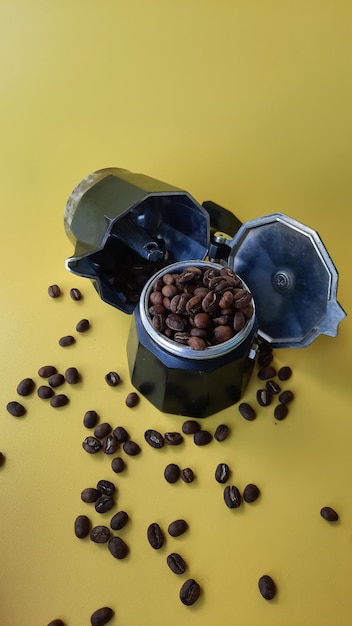 Interior detail of a moka pot a home espresso maker and gayo aceh coffee beans for brewing on a y