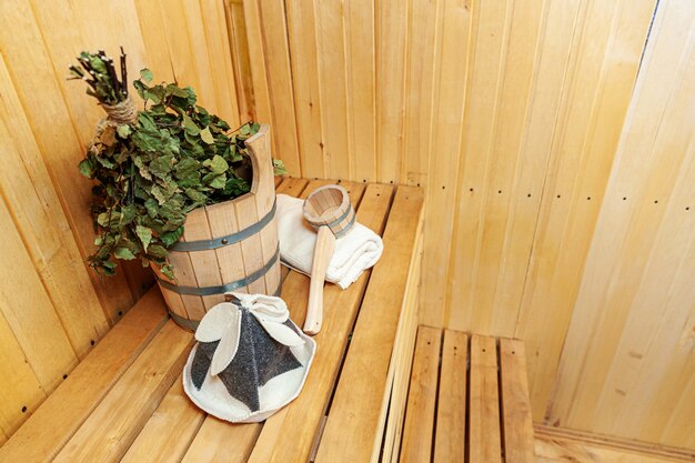 Interior details Finnish sauna steam room with traditional sauna accessories