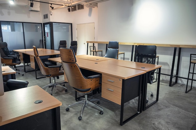 Interior of empty modern office and coworking space temporarily closed and policy for employees to work from home during pandemic of Covid-19, Coronavirus