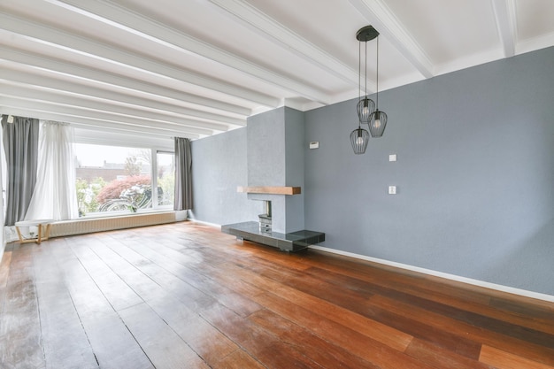 Interior of empty room with fireplace