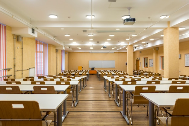 Interior of empty University audiences, modern school classroom