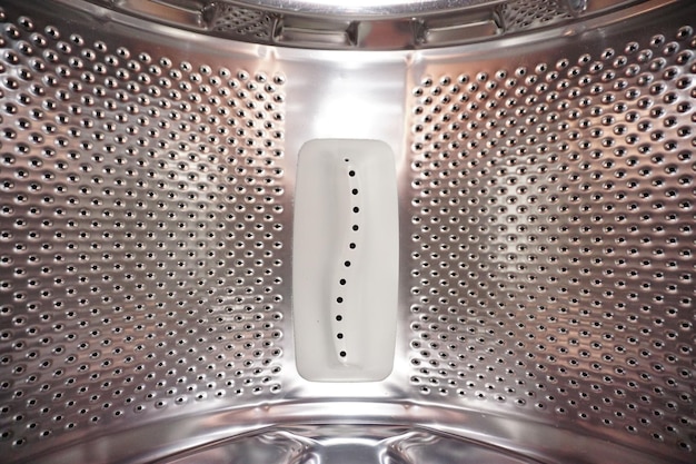 Interior of an empty washing machine drum