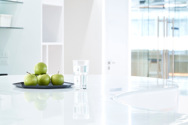 Interior fresh apples on the table