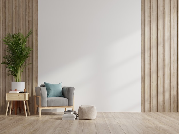 Photo interior has a armchair on empty white wall background.