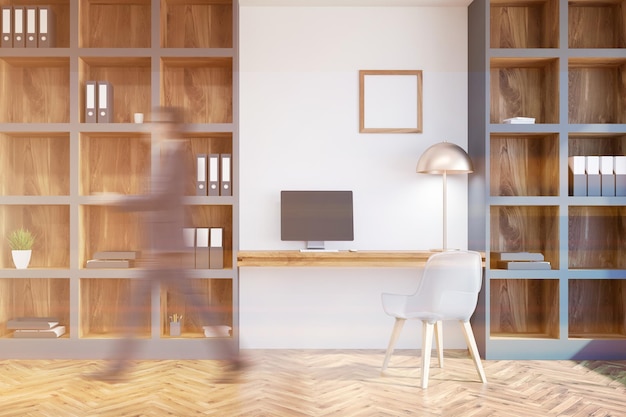 Photo interior of a home office interior with white walls, a computer table with a small square poster and bookcases. businessman 3d rendering mock up toned image blurred