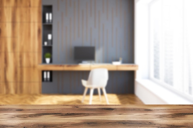 Интерьер домашнего офиса с серыми и деревянными стенами, компьютерным столом и книжными шкафами. 3D рендеринг макет размыт