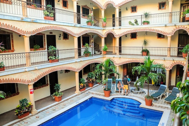 Interior of a hotel with a pool at Playa del Carmen