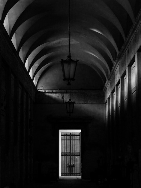 Interior of illuminated building light and dark intimate