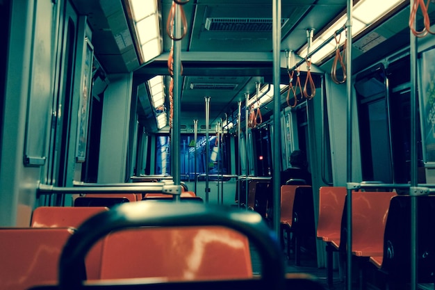 Photo interior of illuminated metro train