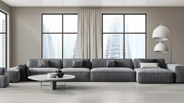Интерьер светлой гостиной с серыми диванами, кофейным столом и большим окном
