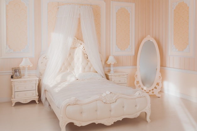 Interior of luxury bedroom in light colors