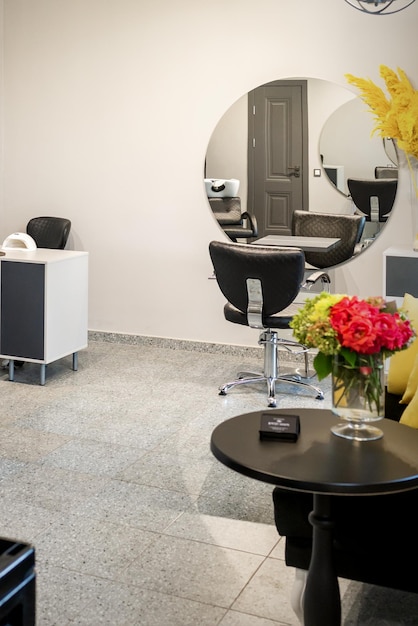 Photo interior of modern bright hair salon, manicure salon, or beauty salon.