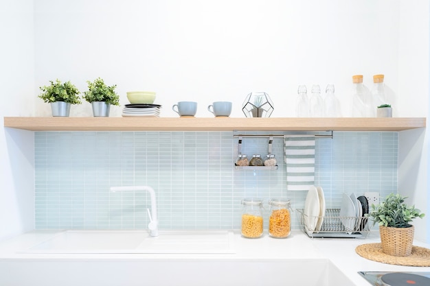 Interior of modern comfortable white kitchen.