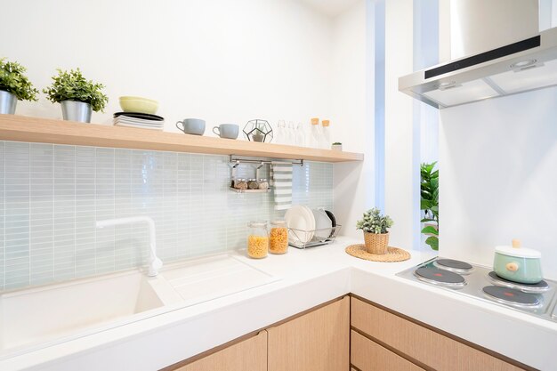 Interior of modern comfortable white kitchen.