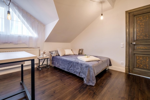 Interior of the modern luxure bedroom in studio apartments