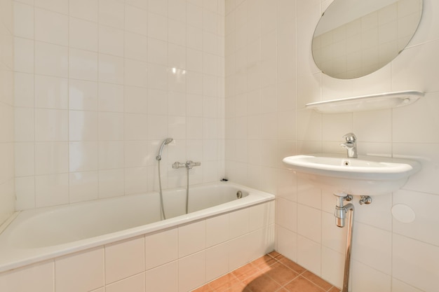 Interior of modern restroom with bathtub