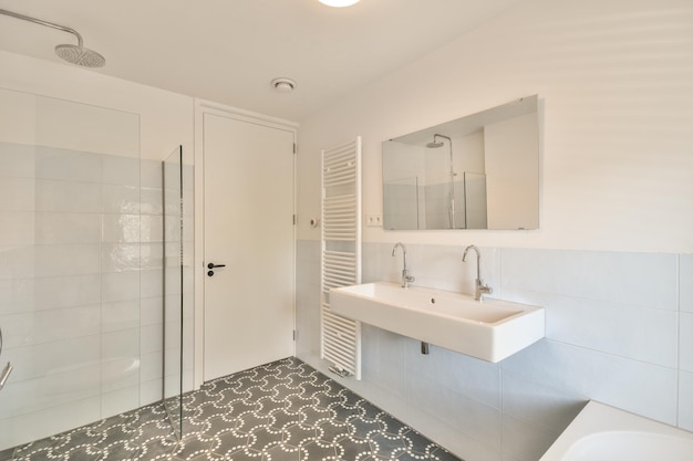 Interior of modern restroom with bathtub