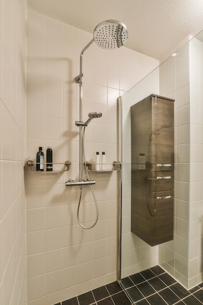 Interior of modern restroom with shower