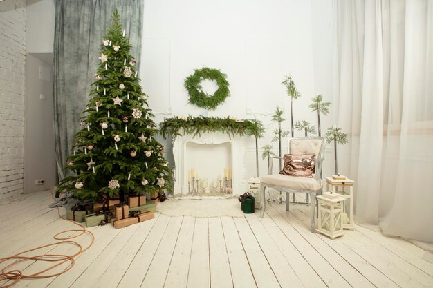 Interior of a New Year's photo studio with a tree