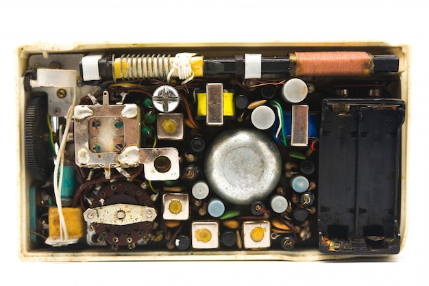 Interior of the old transistor electronics on white 