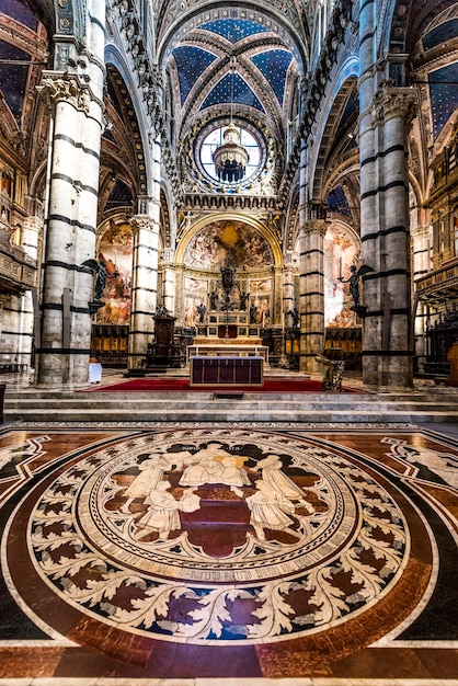 Interior ornate floor mosaic of Siena Cathedral in Florence Italy Europe