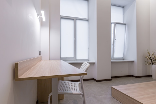 Interior photography, modern bedroom combined with bathroom, in white