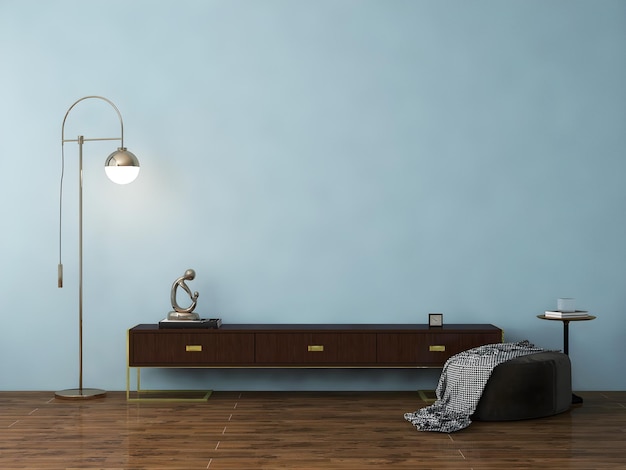 Фото Макет внутренней комнаты с мягкой синей стеной, золотым торшером, табуретом и коричневым столом