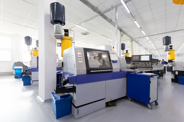 An interior shot of producing line of metal parts in modern plant