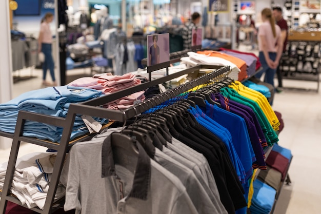 Photo interior shot of racks with shirts and undershirts