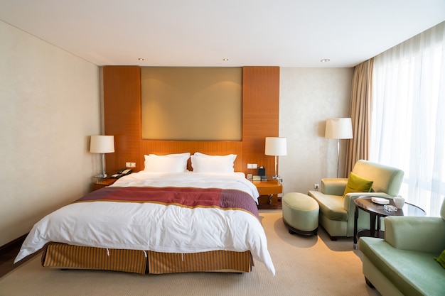 Interior space of big bed room in luxury hotel