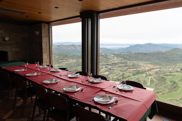 Interior view of a panoramic restaurant with tables set ujue navarra spain