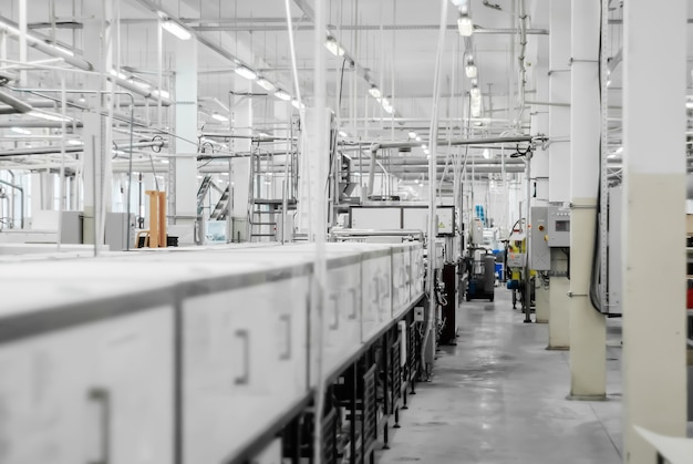 interior view of the workshop of a modern automated confectionery factory with conveyor lines
