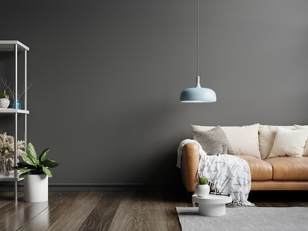 Interior wall mockup in dark tones with leather sofa on black wall background