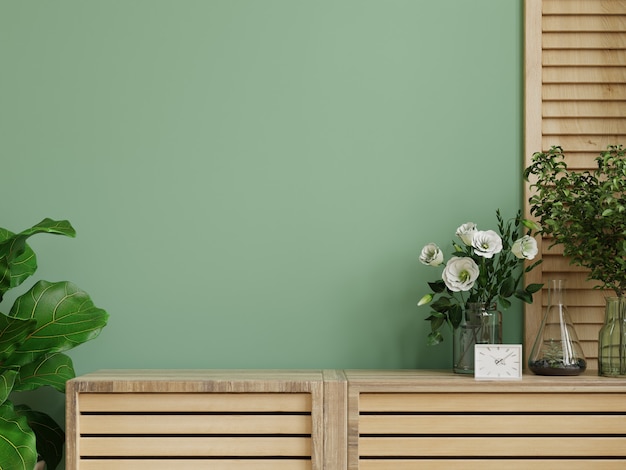 Interior wall mockup with green plant,green wall and shelf.3d rendering