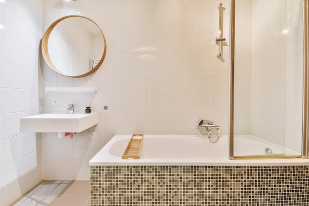 Interior of white tiled bathroom