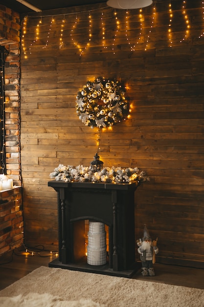 Photo interior with christmas decoration in a golden black style