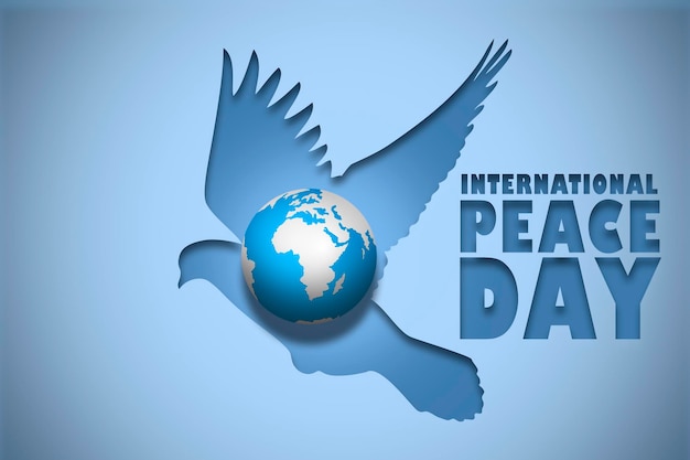 Photo international day of peace dove silhouette on a blue background close up