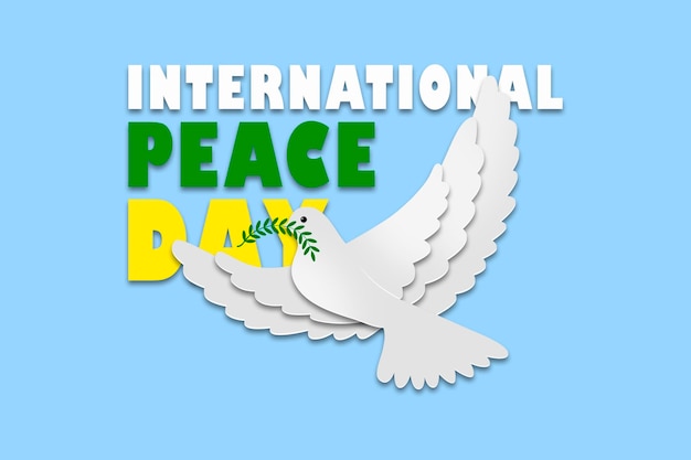 International Day of PEACE White dove on a blue background close up