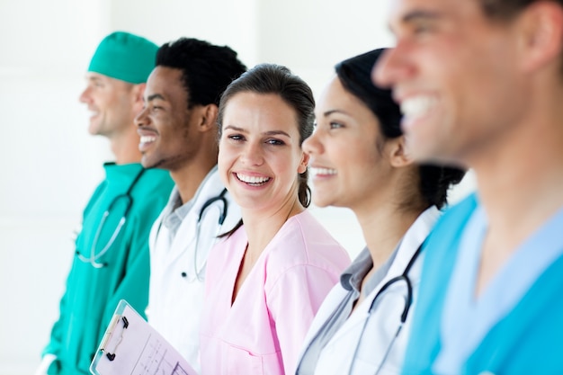 International medical team standing in a line