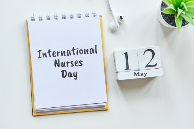 International Nurses Day 12 twelfth May Month Calendar Concept on Wooden Blocks.