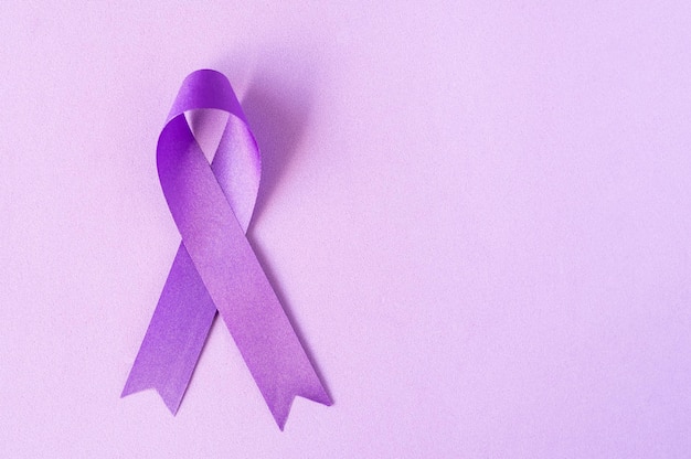 International Overdose Awareness Day The purple ribbon on the purple background