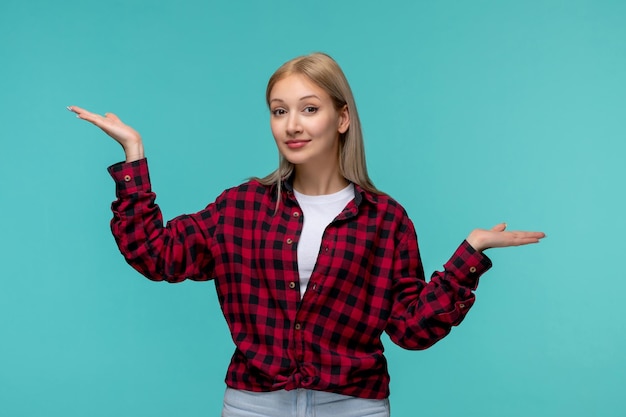 International students day pretty cute lady in red checked shirt waving hands in the air