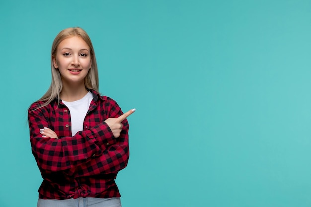 International students day young cute girl in red checked shirt smiling with crossed hands