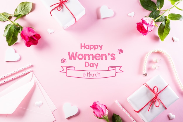 International Women's Day concept on bright pink pastel background