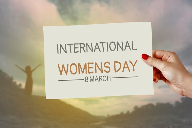 International women39s day card on hand Greeting for 8 March Happy Womens Day 25 November International Day for the Elimination of Violence against Women