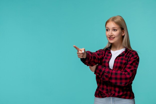 Internationale studentendag mooi schattig meisje in rood geruit overhemd blij wijzende vinger